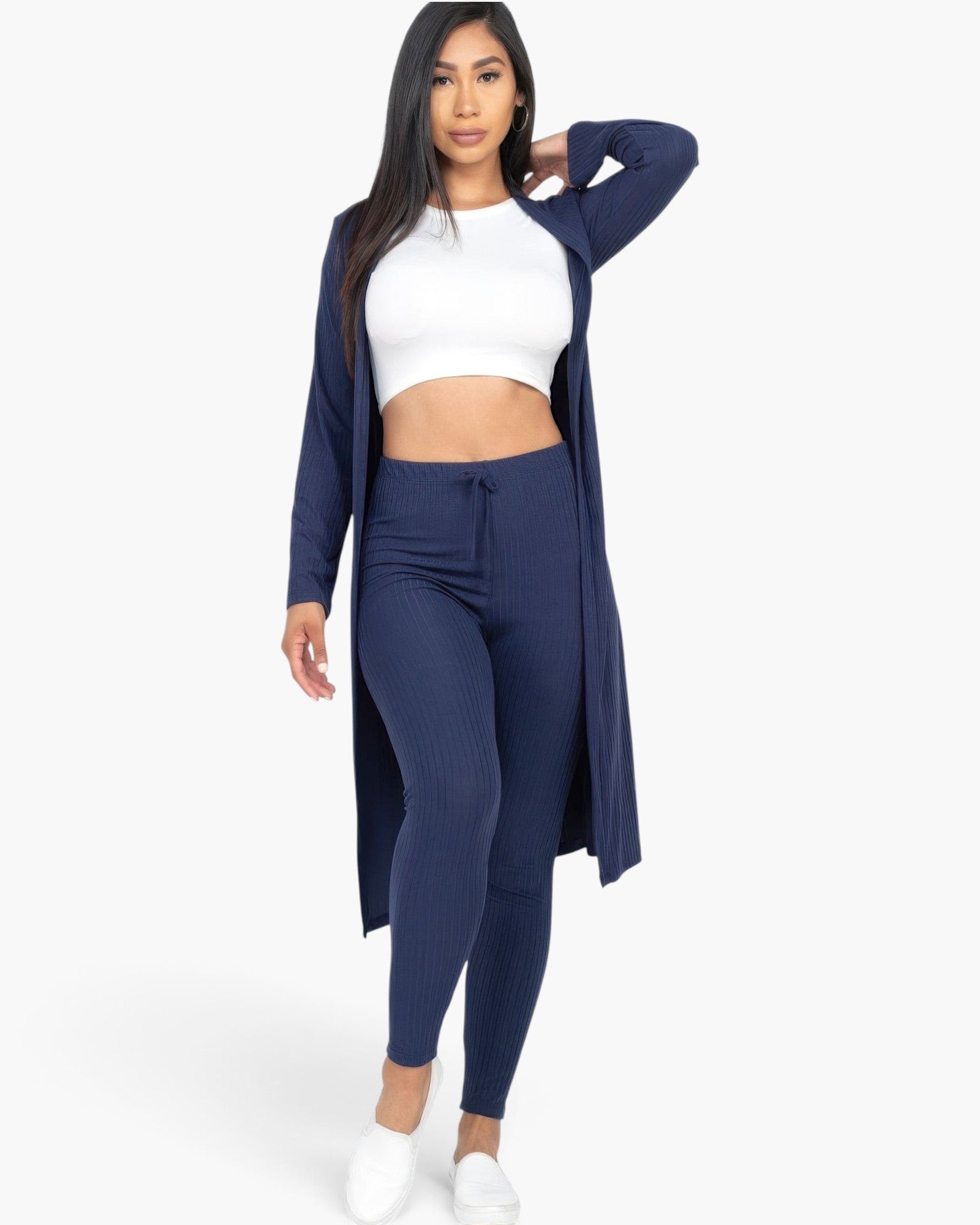 Beach Rose Co. navy blue ribbed long cardigan and leggings set worn by a model with a white crop top