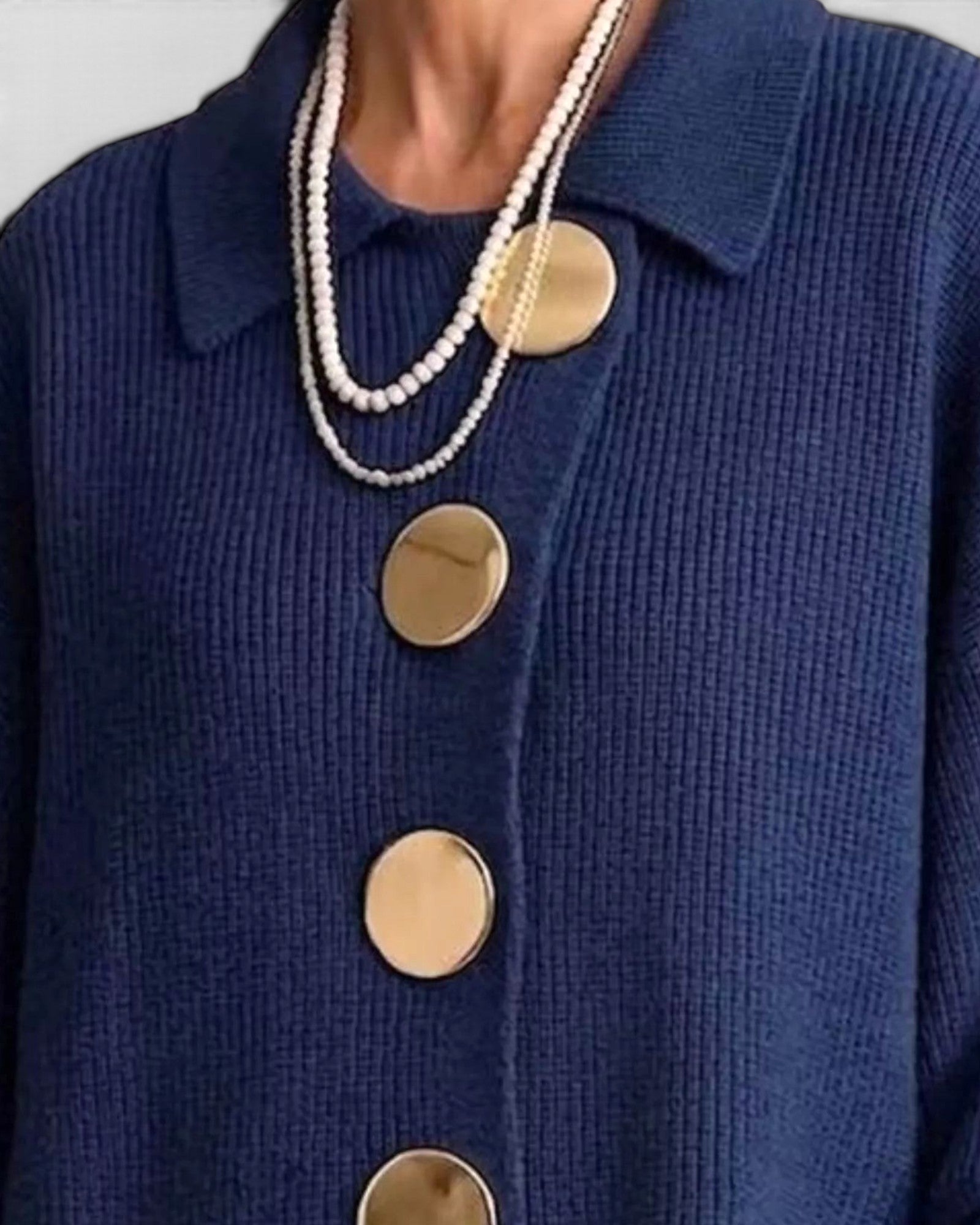 Beach Rose Co. navy blue ribbed knit cardigan with a fold-over collar and large gold-tone round buttons.