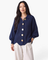 Beach Rose Co. navy blue ribbed knit cardigan with oversized gold buttons, balloon sleeves, and a scalloped hem.