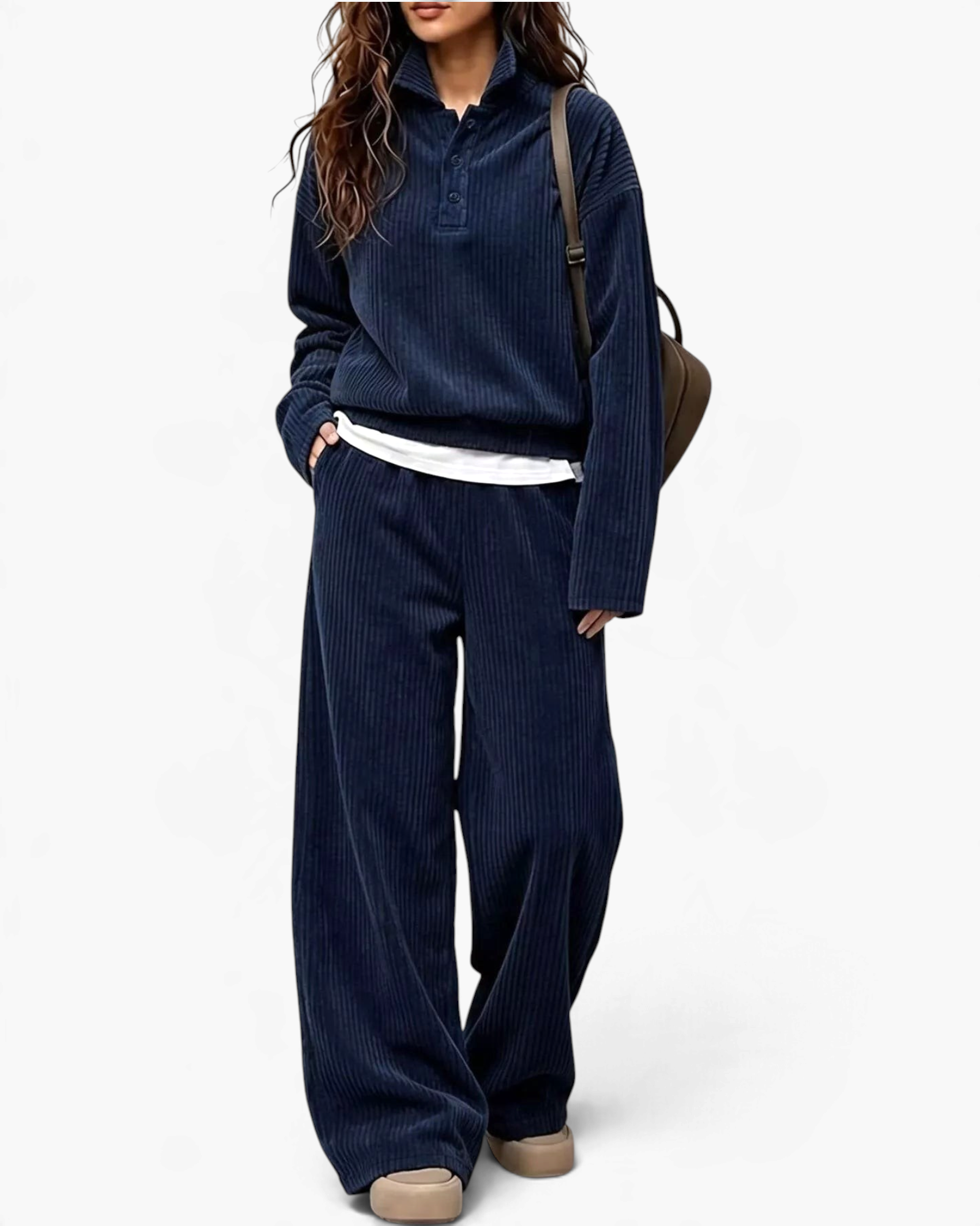 Beach Rose Co. navy blue ribbed two-piece set with a collared button-placket top and wide leg pants on a model.