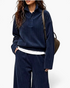 Beach Rose Co. navy blue ribbed two-piece set with a collared button-placket top and wide leg pants on a model.