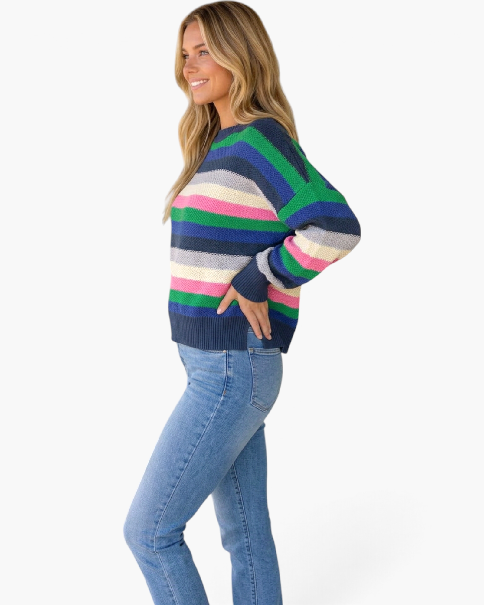 Beach Rose Co. navy knit sweater with multicolor horizontal stripes, crew neck, and relaxed fit on a smiling model.