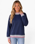 Beach Rose Co. navy mock neck sweatshirt with striped ribbed trim and dropped shoulders worn by a smiling woman.