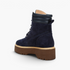 Beach Rose Co. navy blue suede lace-up ankle boots with a chunky lug sole and padded quilted collar, rear view.