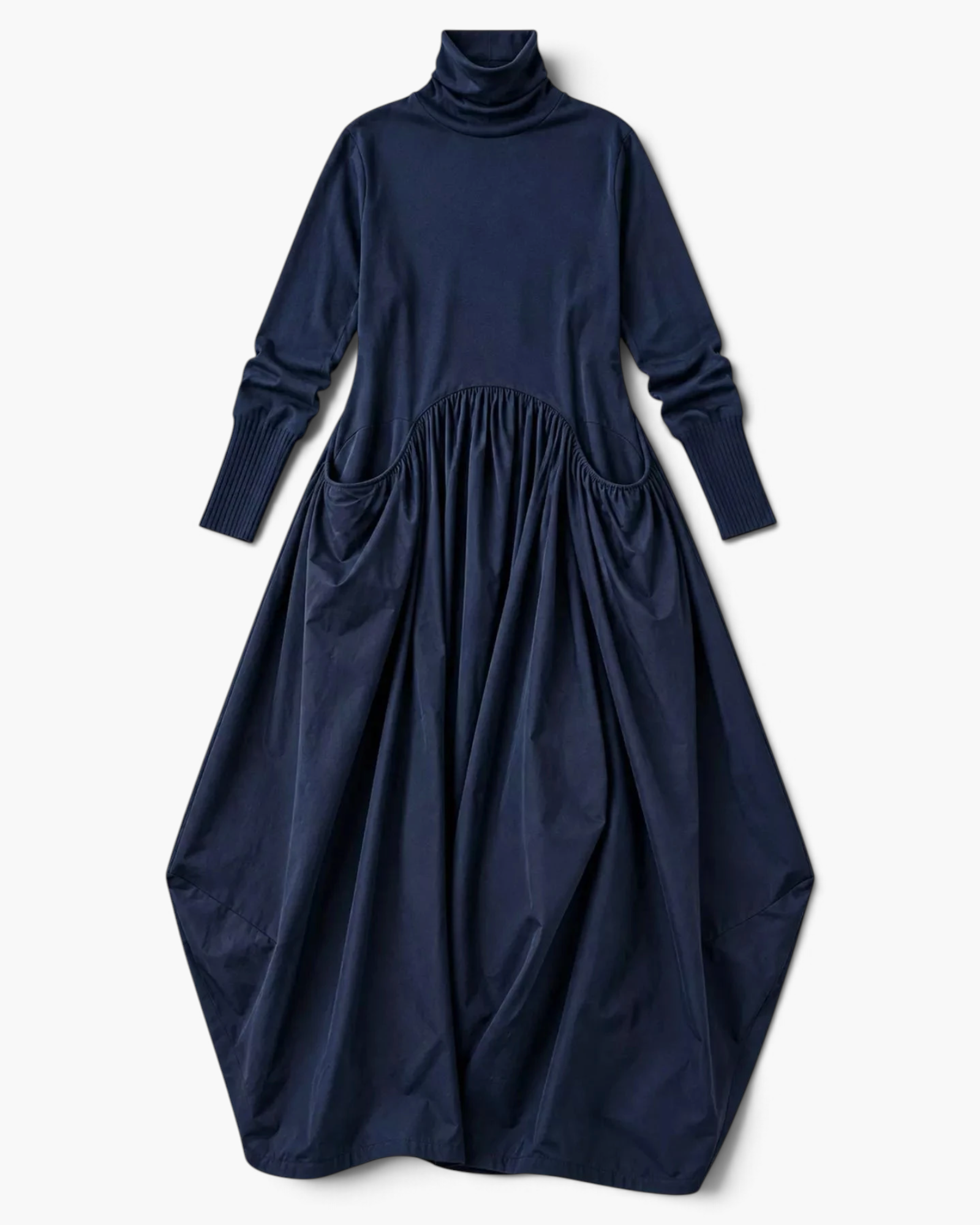 Beach Rose Co. navy blue turtleneck maxi dress with a sweater bodice, gathered skirt, and sculptural balloon hem.