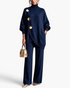 Beach Rose Co. navy blue turtleneck tunic and wide-leg pants set with oversized gold buttons and ribbed trim.