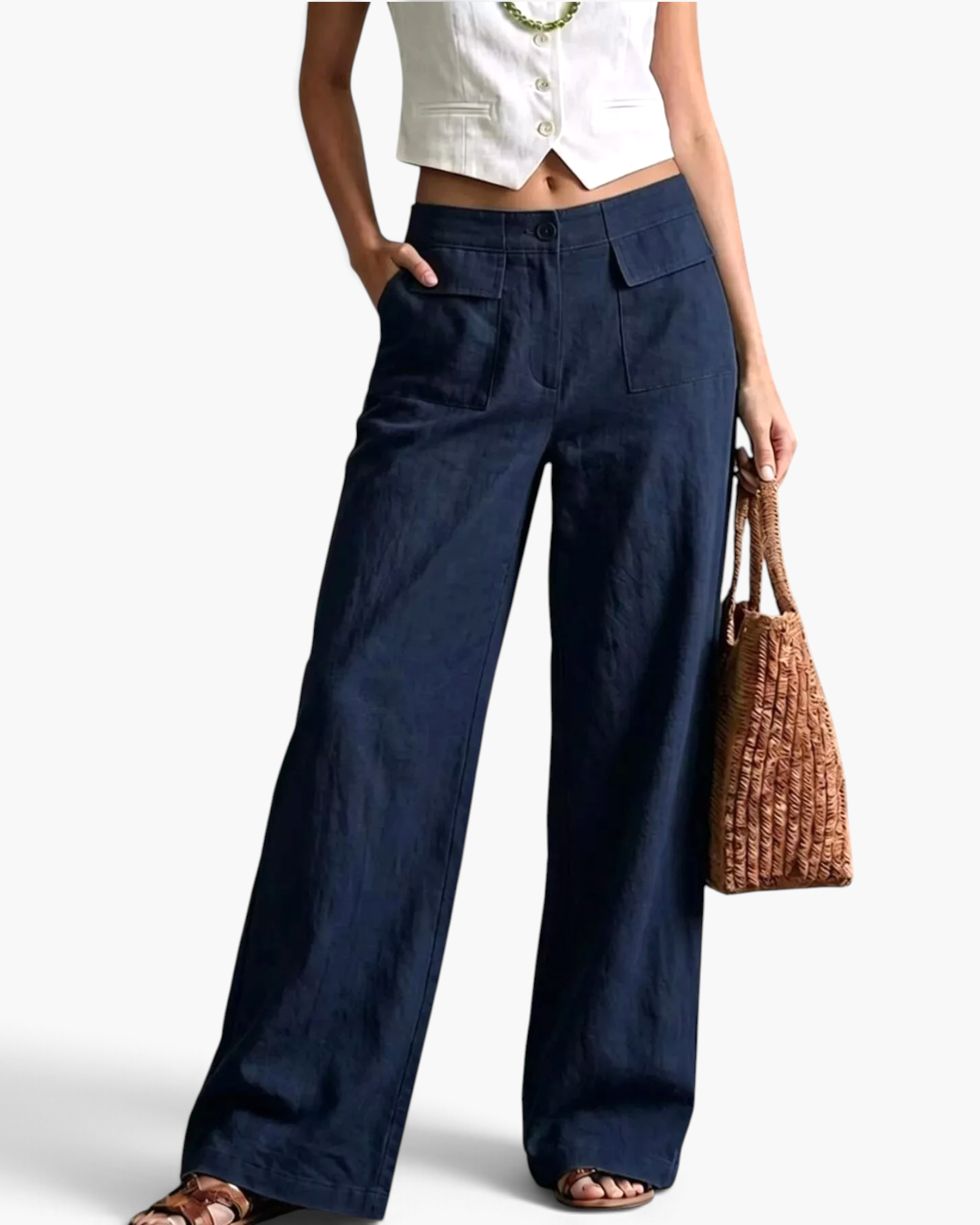 Beach Rose Co. navy blue wide-leg cotton blend pants with utility-style front flap pockets and a flat waistband.
