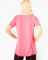 Back view of a Beach Rose Co. neon pink short-sleeve tunic top with a relaxed A-line fit on a blonde model.