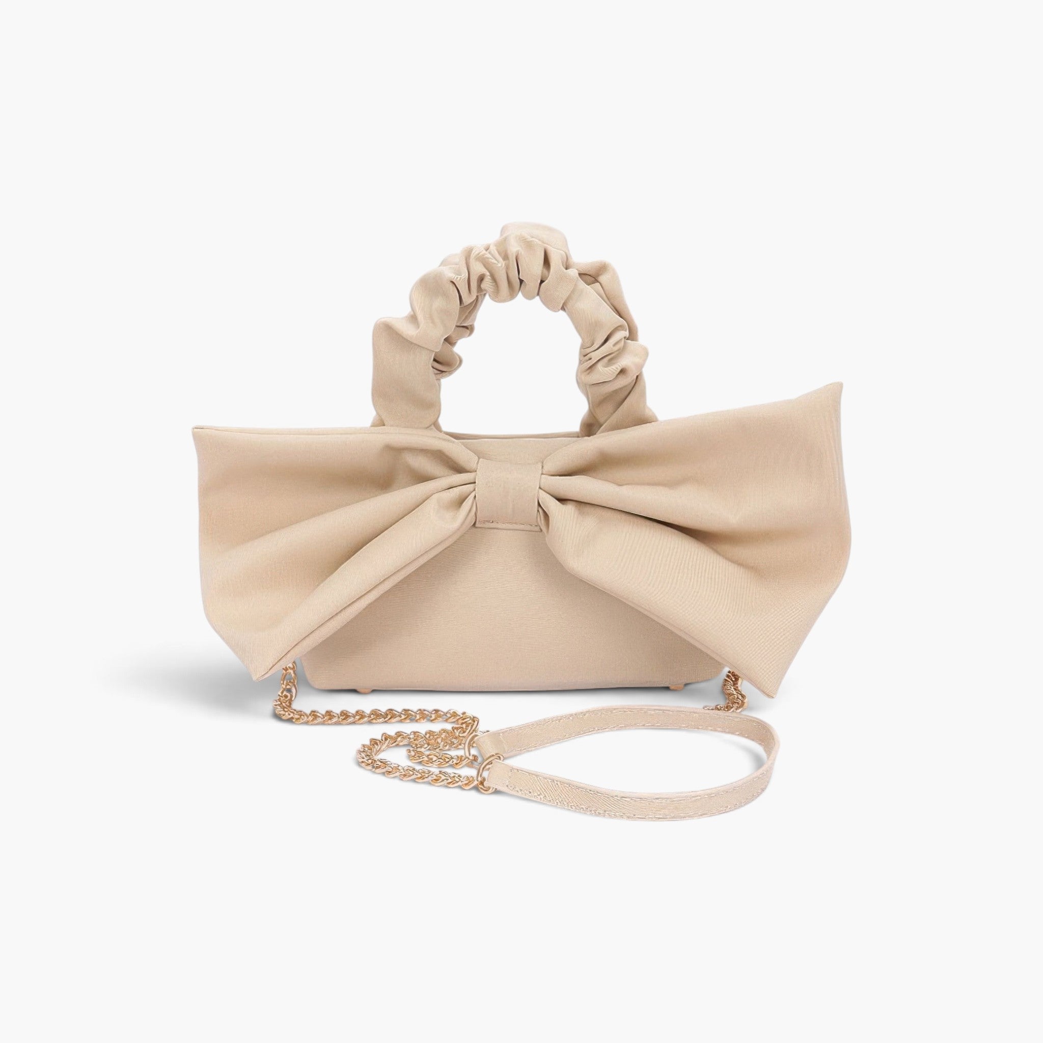 Beach Rose Co. nude nylon clutch with a large front bow, ruched top handle, and detachable gold chain shoulder strap.