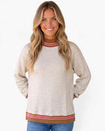 Beach Rose Co. oatmeal textured sweatshirt with a mock neck, pink and brown striped trim, and relaxed dropped shoulders.