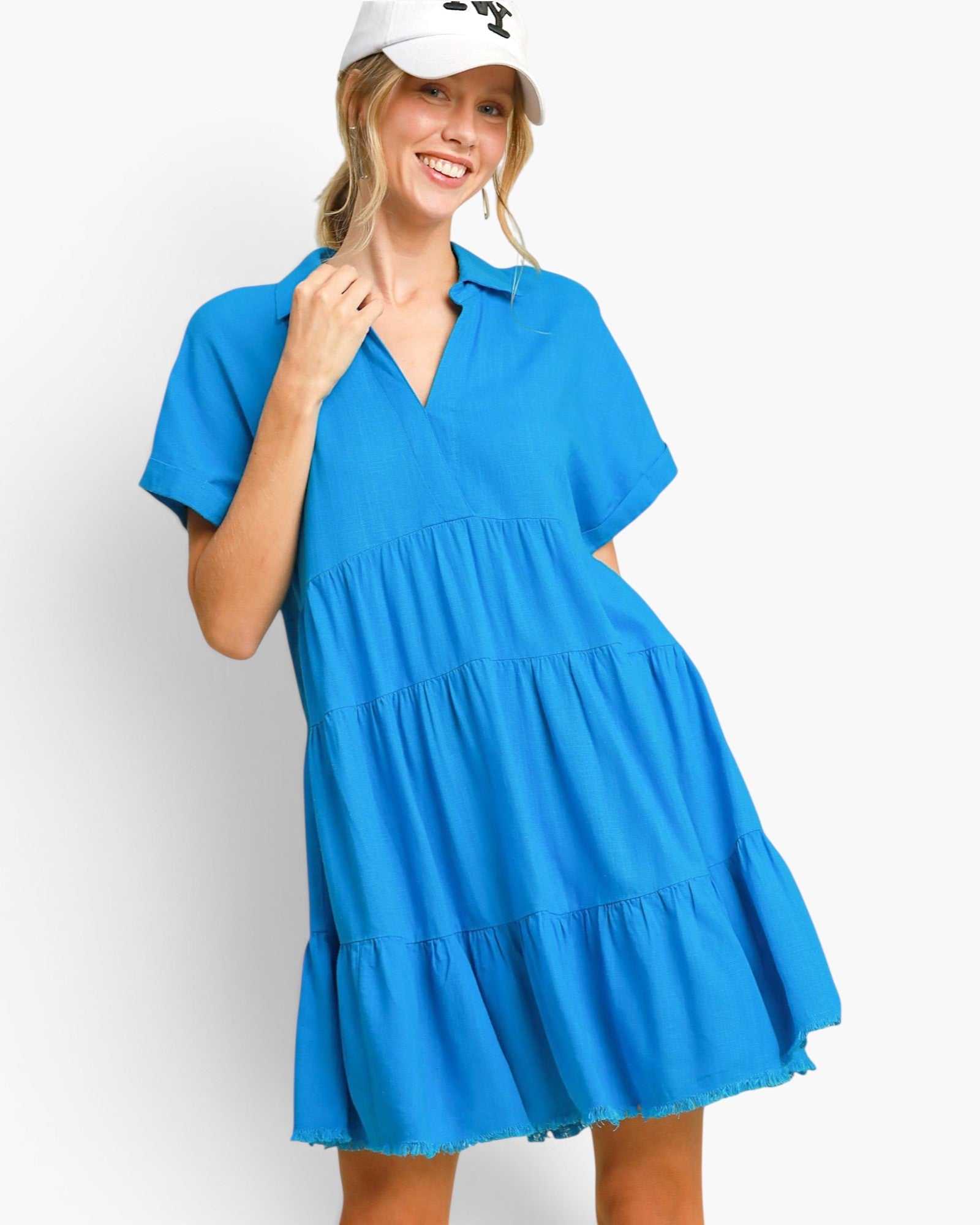 Beach Rose Co. ocean blue linen-blend mini dress with a collared V-neck, tiered silhouette, and frayed hem.
