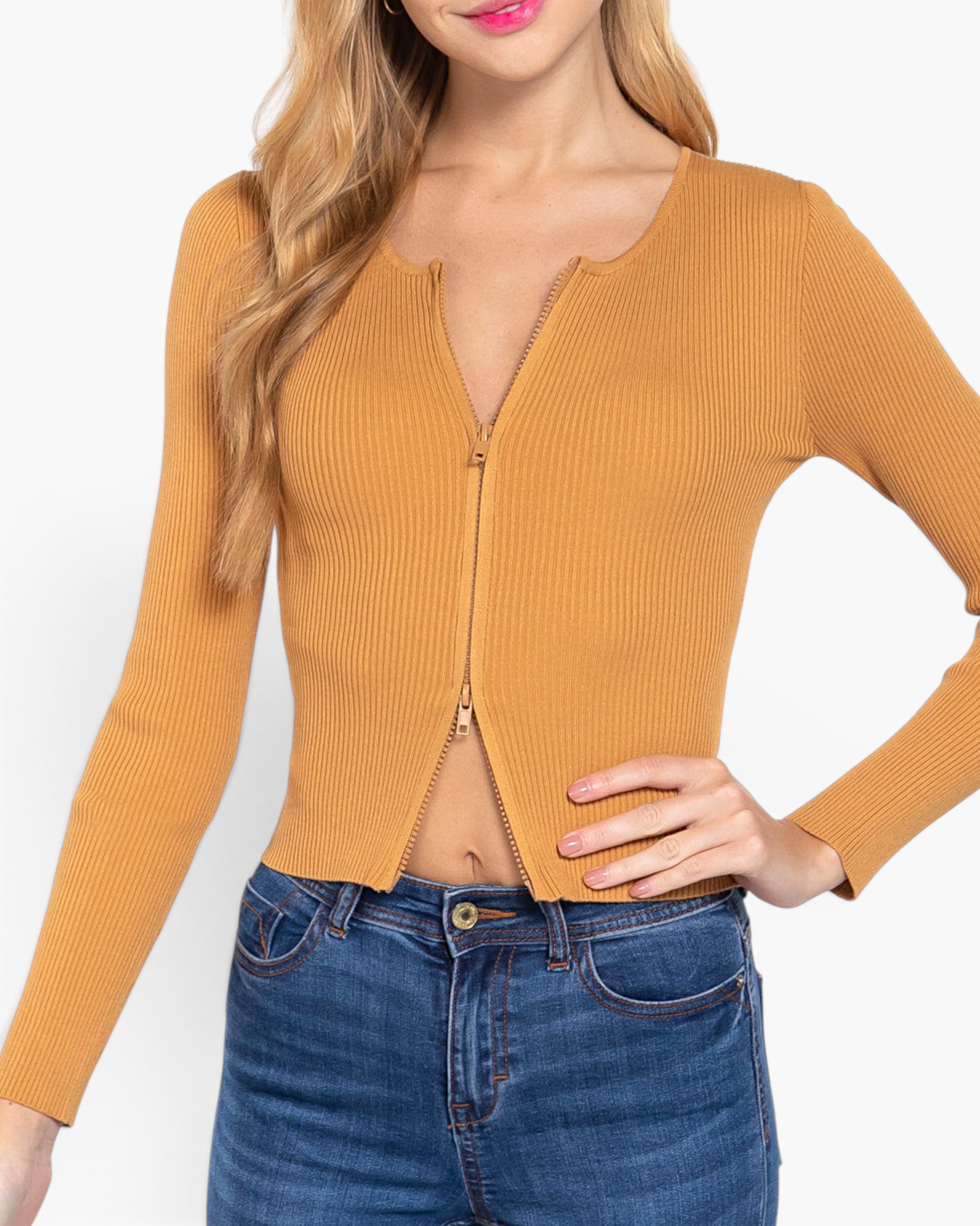 Beach Rose Co. ochre ribbed sweater top with a front zipper, worn with blue jeans on a model.