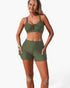 Beach Rose Co. olive green two-piece bikini with a crisscross top and high-waisted tummy control shorts with pockets.