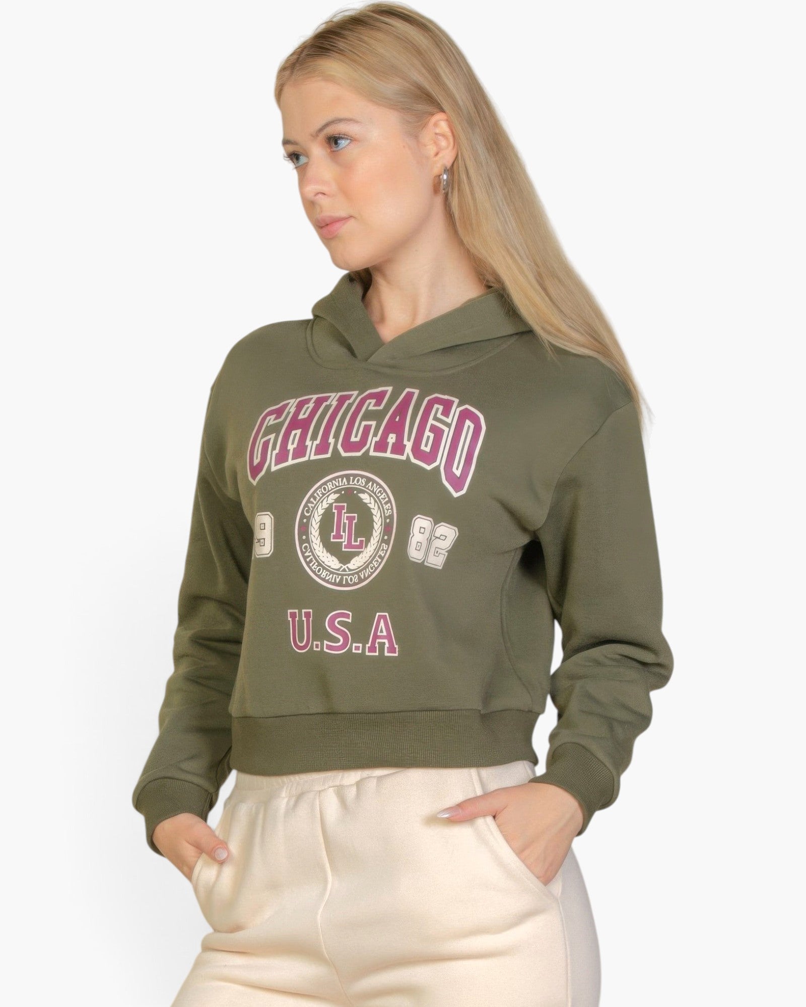 Beach Rose Co. olive green drop shoulder hoodie with Chicago graphic print worn by a blonde model