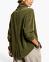 Beach Rose Co. olive green corduroy jacket with a foldover collar, dropped shoulders, and a back hem vent.