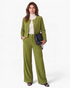 Beach Rose Co. olive green corduroy two-piece set with a button-front jacket and wide-leg pants on a female model.