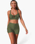 Beach Rose Co. olive green two-piece bikini with a crisscross top and high-waisted tummy control shorts.