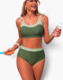 Beach Rose Co. two-piece olive green colorblock bikini with a sleeveless top and high-waisted bottoms on a model.