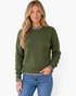 Beach Rose Co. olive green knit sweater with gingham ruffle trim at the neckline, cuffs, and hem on a blonde model.