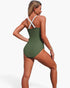Beach Rose Co. olive green one-piece swimsuit with white cross-back straps and a flattering stretch fit.