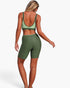 Beach Rose Co. two-piece olive green color block yoga set with a sleeveless sports bra and matching biker shorts.