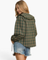 Beach Rose Co. olive plaid top with oversized ruffle sailor collar and long balloon sleeves worn with denim shorts.