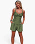 Beach Rose Co. olive green two-piece swimsuit with pleated tank top, sling straps, and pocketed shorts on a model