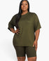 Beach Rose Co. plus size olive green loose fit top and matching biker shorts set on a model