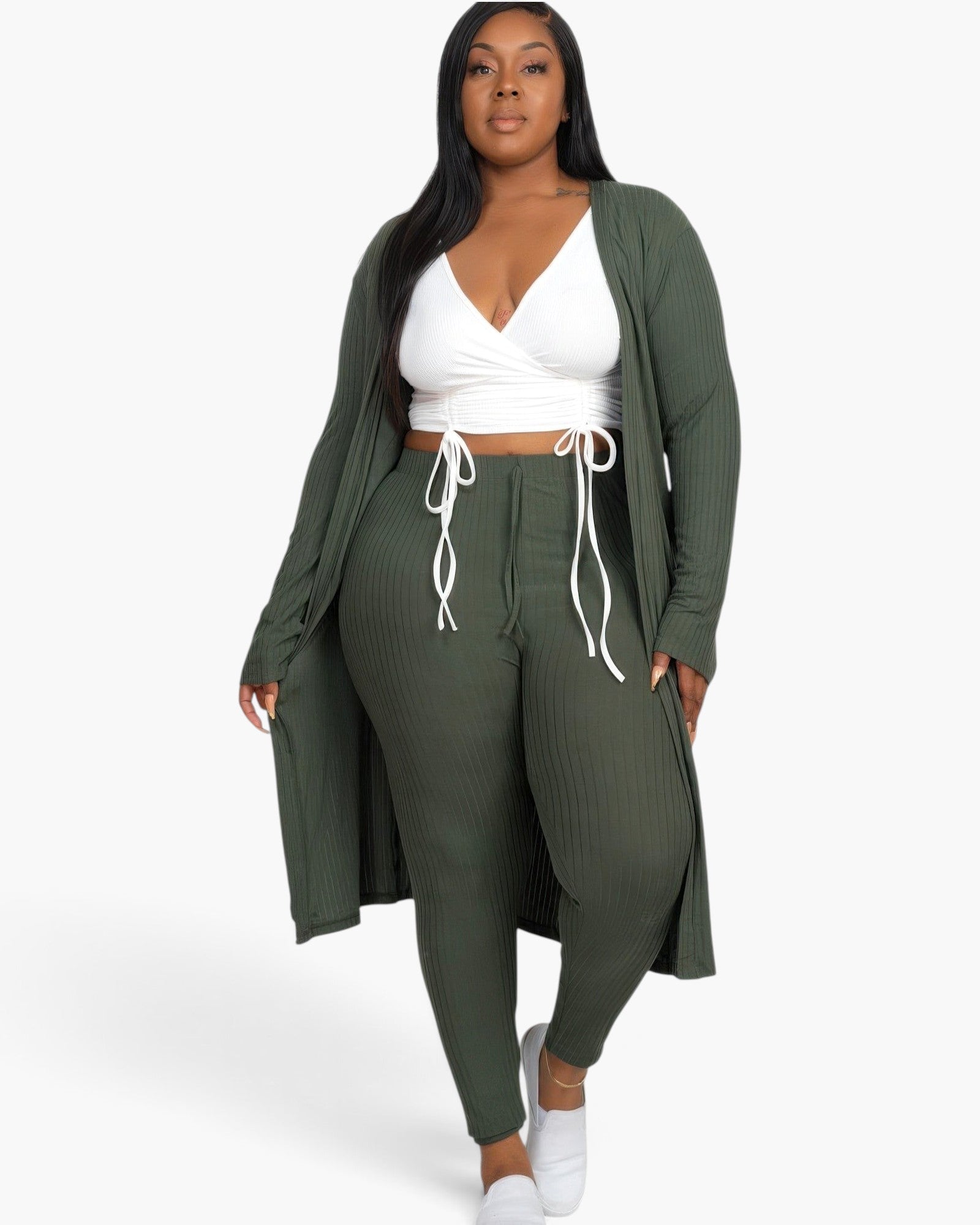 Beach Rose Co. plus size olive green ribbed long cardigan and leggings set worn by a model with a white crop top.