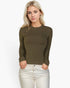 Beach Rose Co. olive green ribbed long-sleeve crew-neck top worn by a blonde model with white jeans.