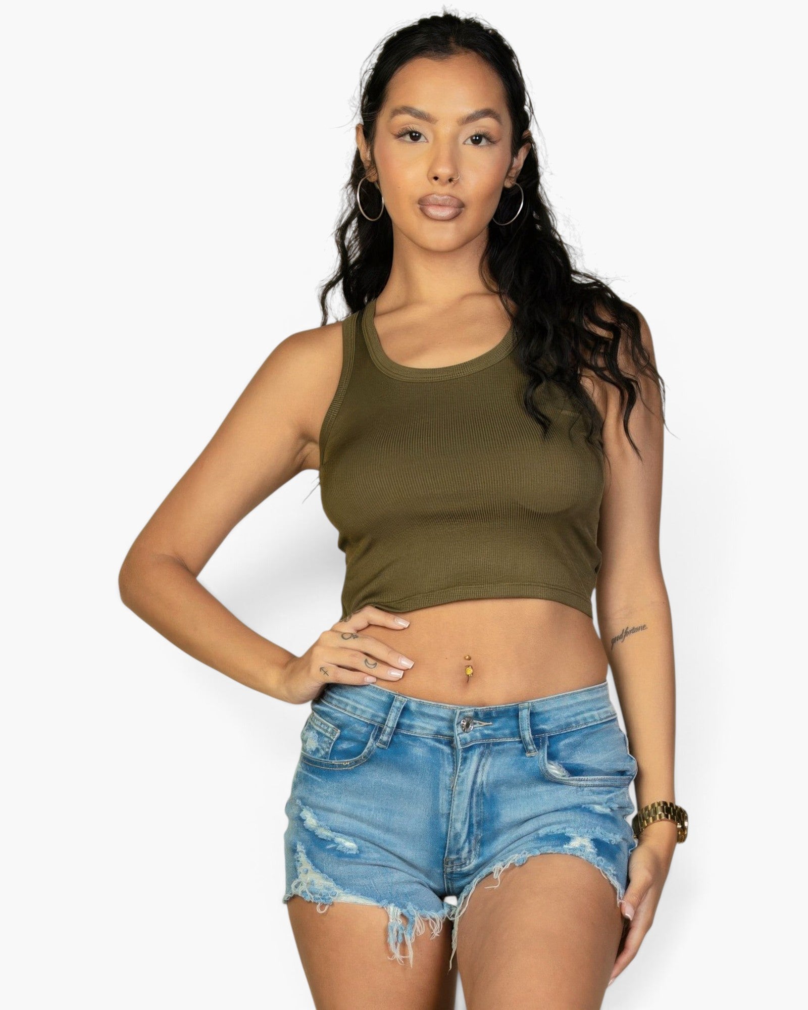 Beach Rose Co. olive green ribbed tank top worn by a model with denim shorts, featuring a form-fitting design.