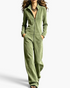 Beach Rose Co. olive green velour wide-leg jumpsuit with a stand collar, front zipper, and side pockets.