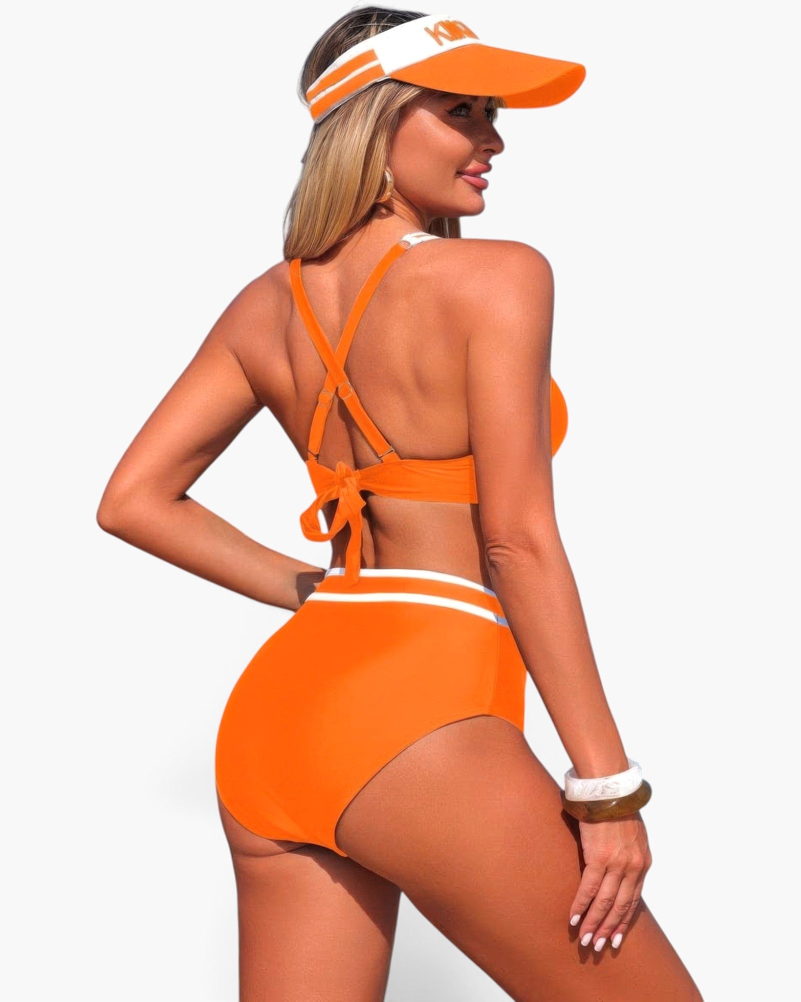 Beach Rose Co. orange high-waisted bikini with cross-back straps and white trim, worn by a model with a visor.