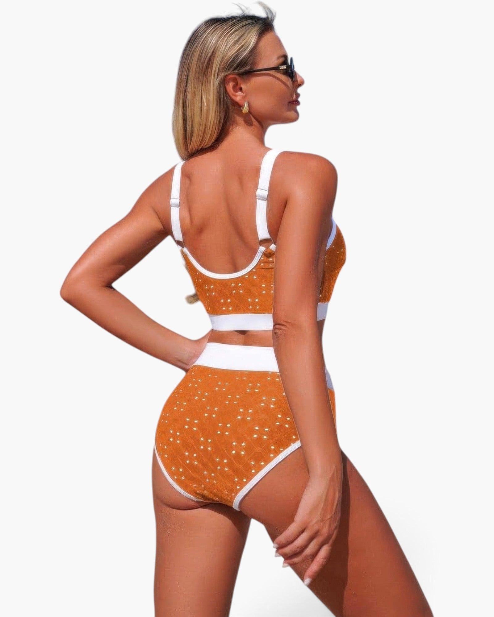 Beach Rose Co. orange polka-dot high-waisted bikini set with white contrast trim and adjustable straps on a model
