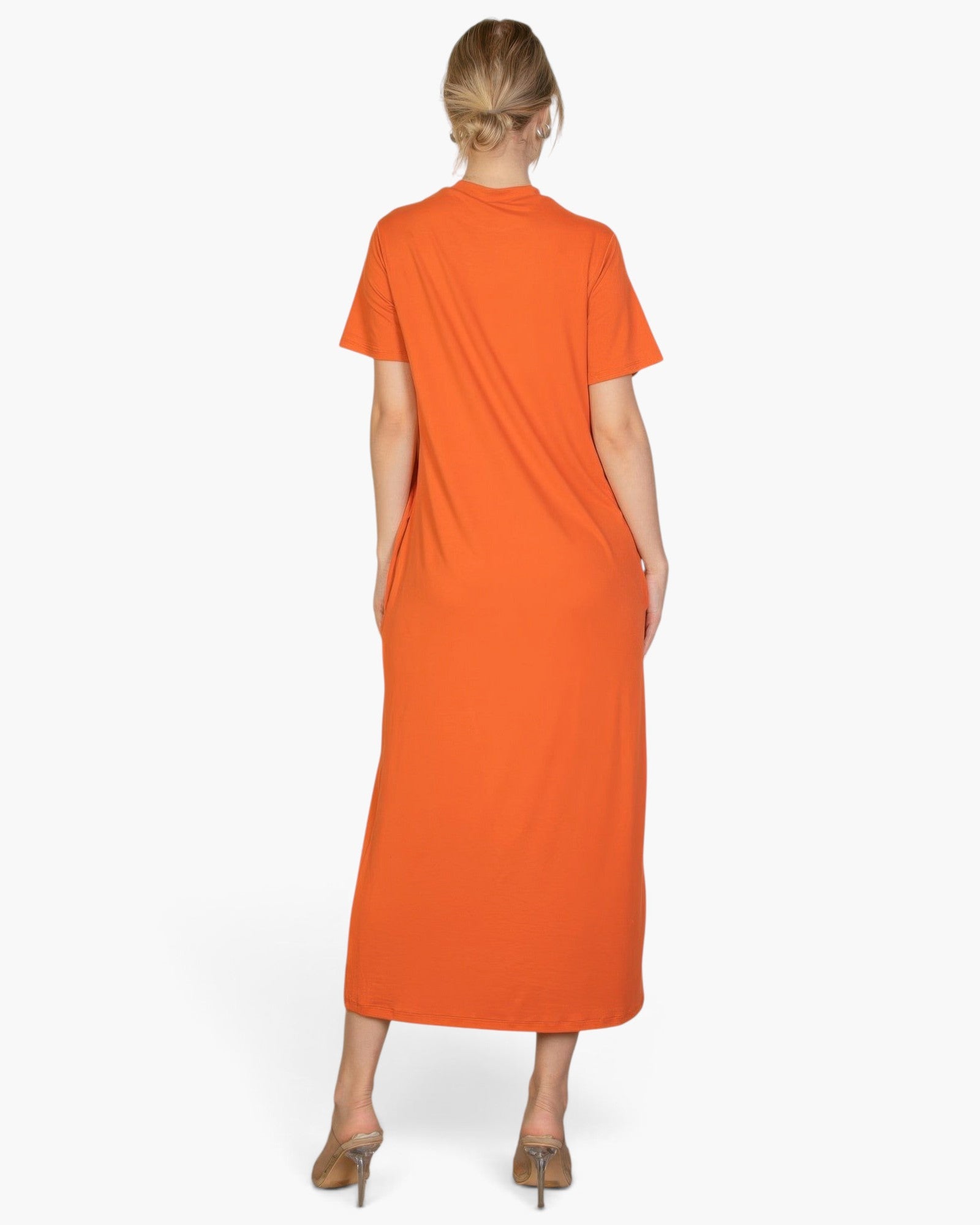 Beach Rose Co. orange short-sleeve tee dress in a relaxed jersey fabric, shown from the back on a model.