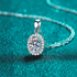 Beach Rose Co. 1 carat oval moissanite pendant necklace with a zircon halo on a sterling silver chain.