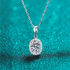 Beach Rose Co. 1 carat oval moissanite pendant necklace with a zircon halo on a sterling silver chain.