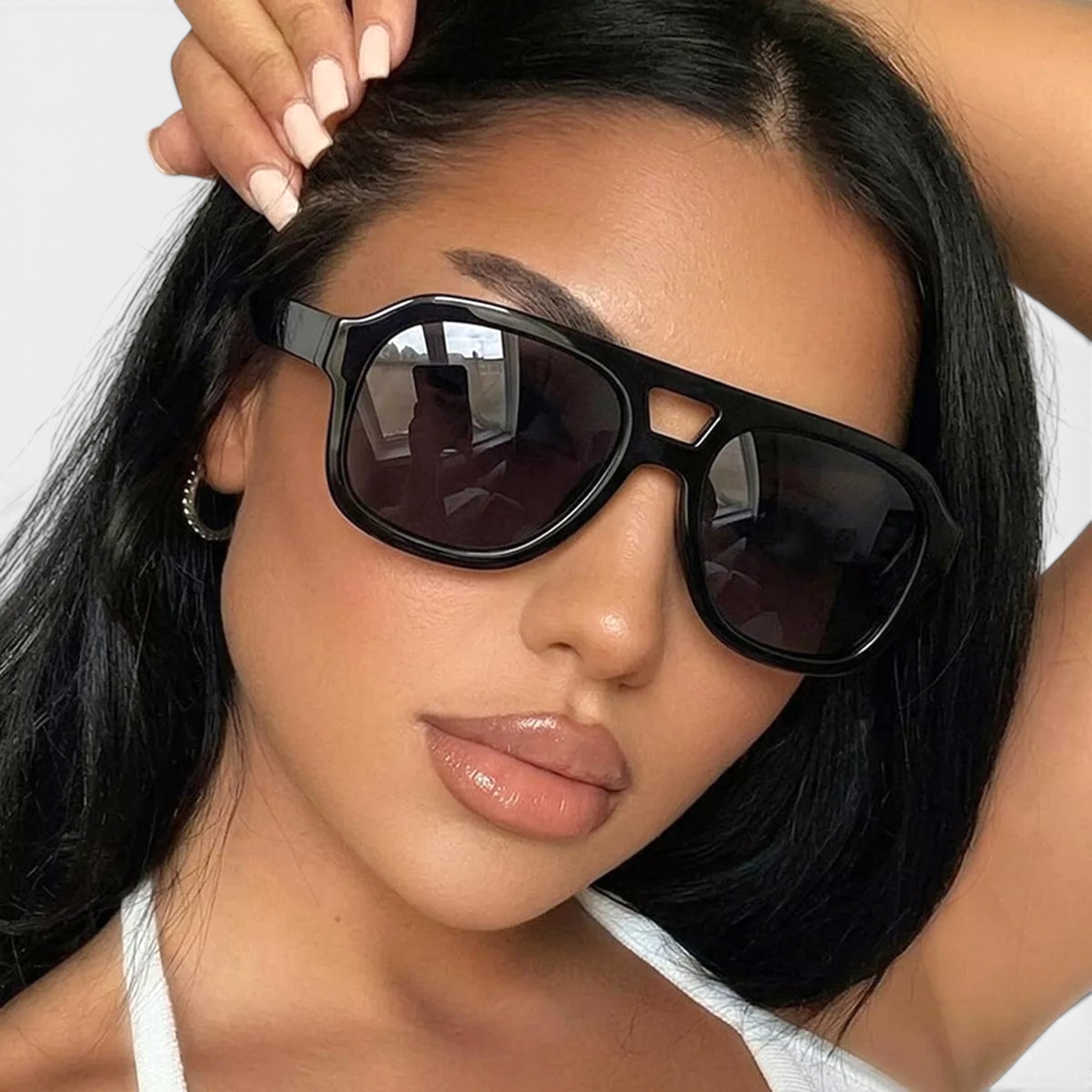 Beach Rose Co. oversized black square aviator sunglasses with a double bridge worn by a woman with dark hair.