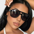 Beach Rose Co. oversized black square aviator sunglasses with a double bridge worn by a woman with dark hair.