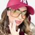 Beach Rose Co. oversized square sunglasses with a flat-top browline and gradient lenses worn by a woman in a cap.