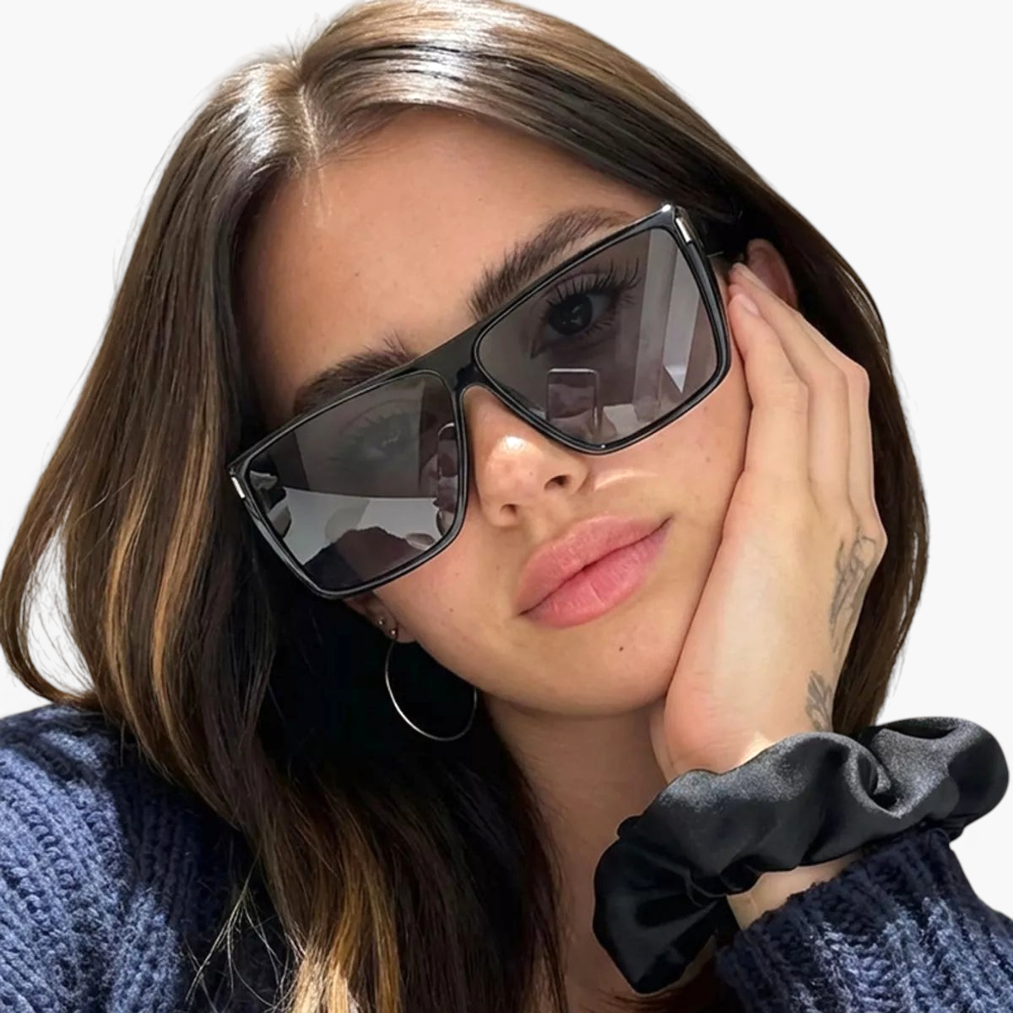 Beach Rose Co. oversized square sunglasses with a flat-top browline and black frames worn by a woman.