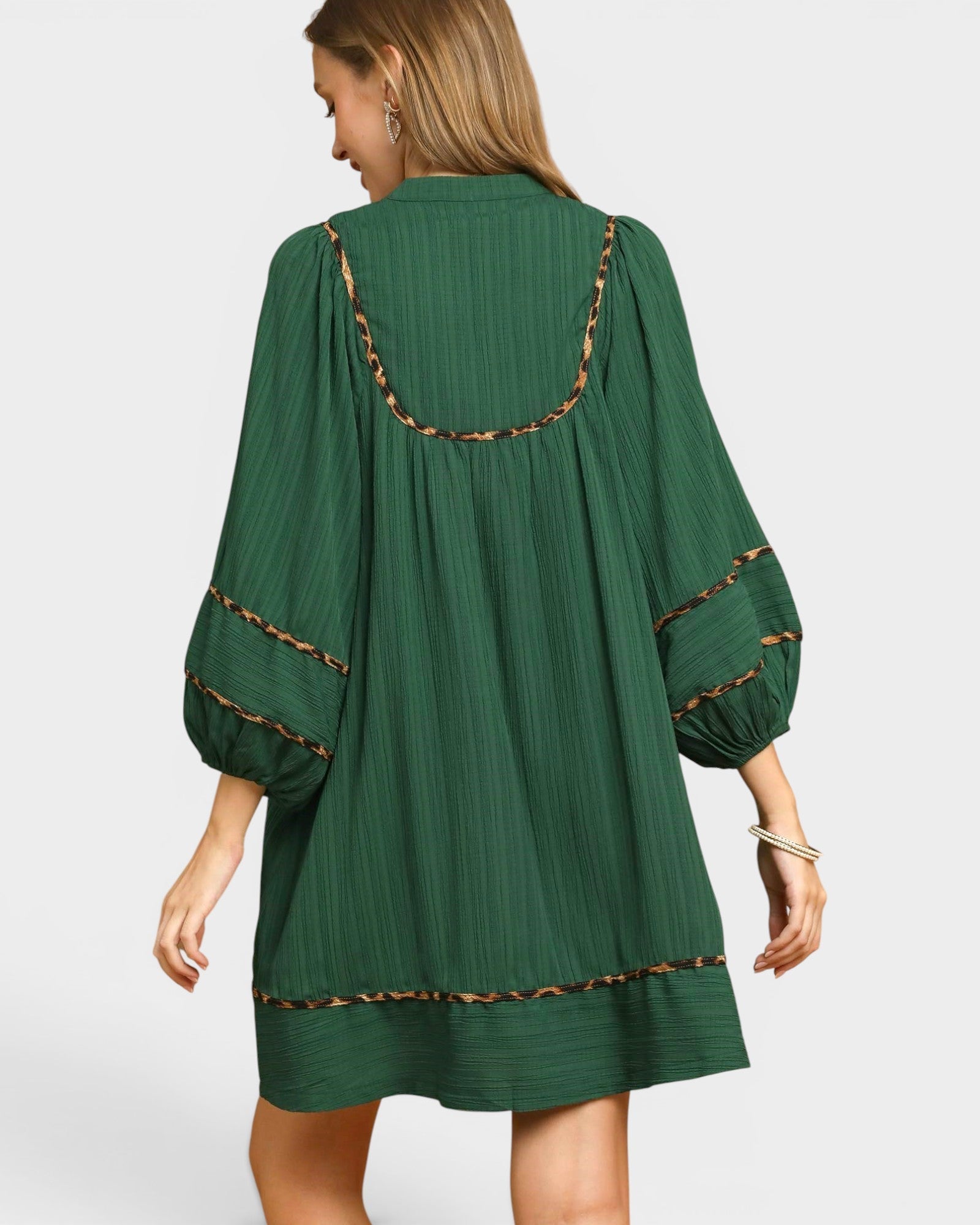 Beach Rose Co. palm green dress with balloon sleeves and leopard-print trim, back view on a model.