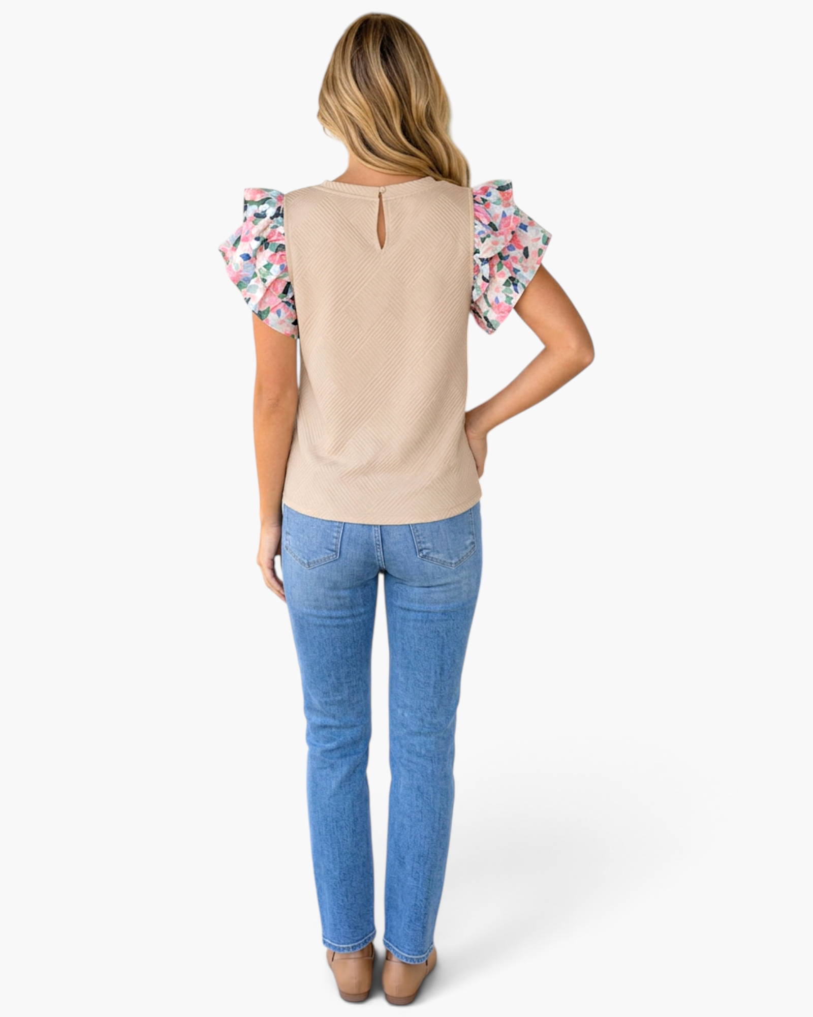 Beach Rose Co. parchment textured top with floral ruffle sleeves and back keyhole closure, back view on a model.