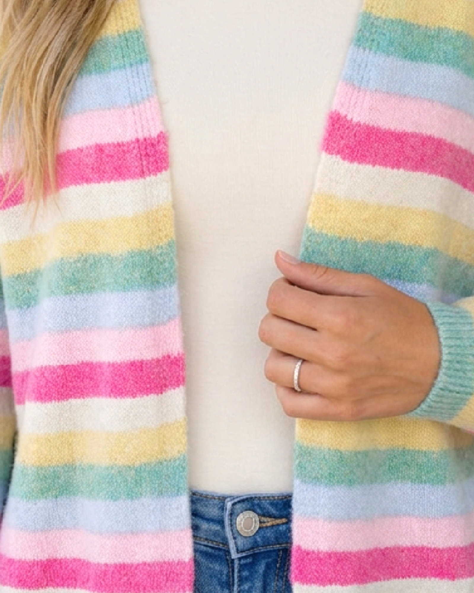 Beach Rose Co. open-front knit cardigan featuring horizontal pastel pink, blue, yellow, and cream stripes.