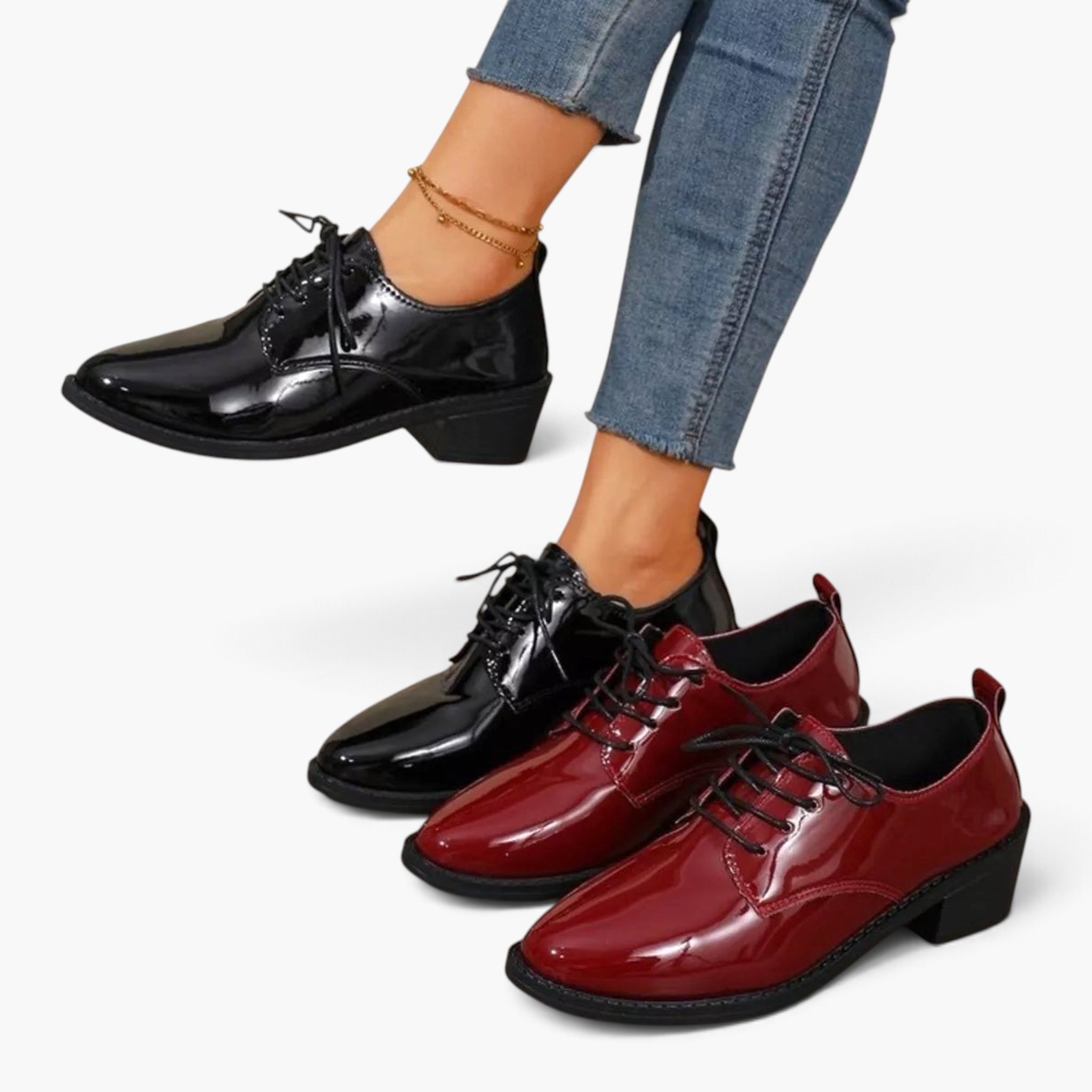 Beach Rose Co. patent lace-up oxford shoes in black and burgundy with low block heels and stitched panel details.
