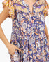 Beach Rose Co. peacock blue floral maxi dress with flutter sleeves, split neckline, and hidden side pockets.