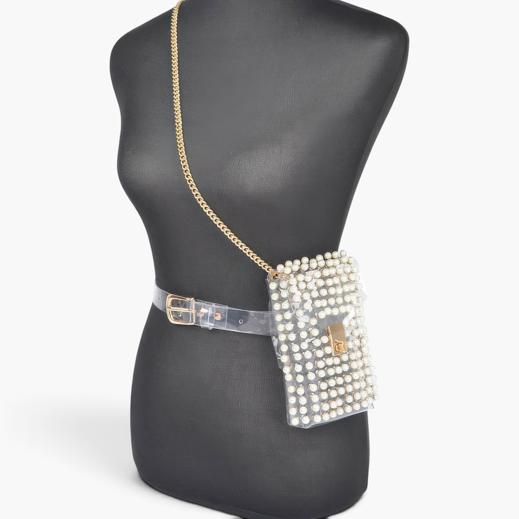 Beach Rose Co. clear PVC belt bag adorned with white pearls and gold chain strap displayed on a black mannequin.