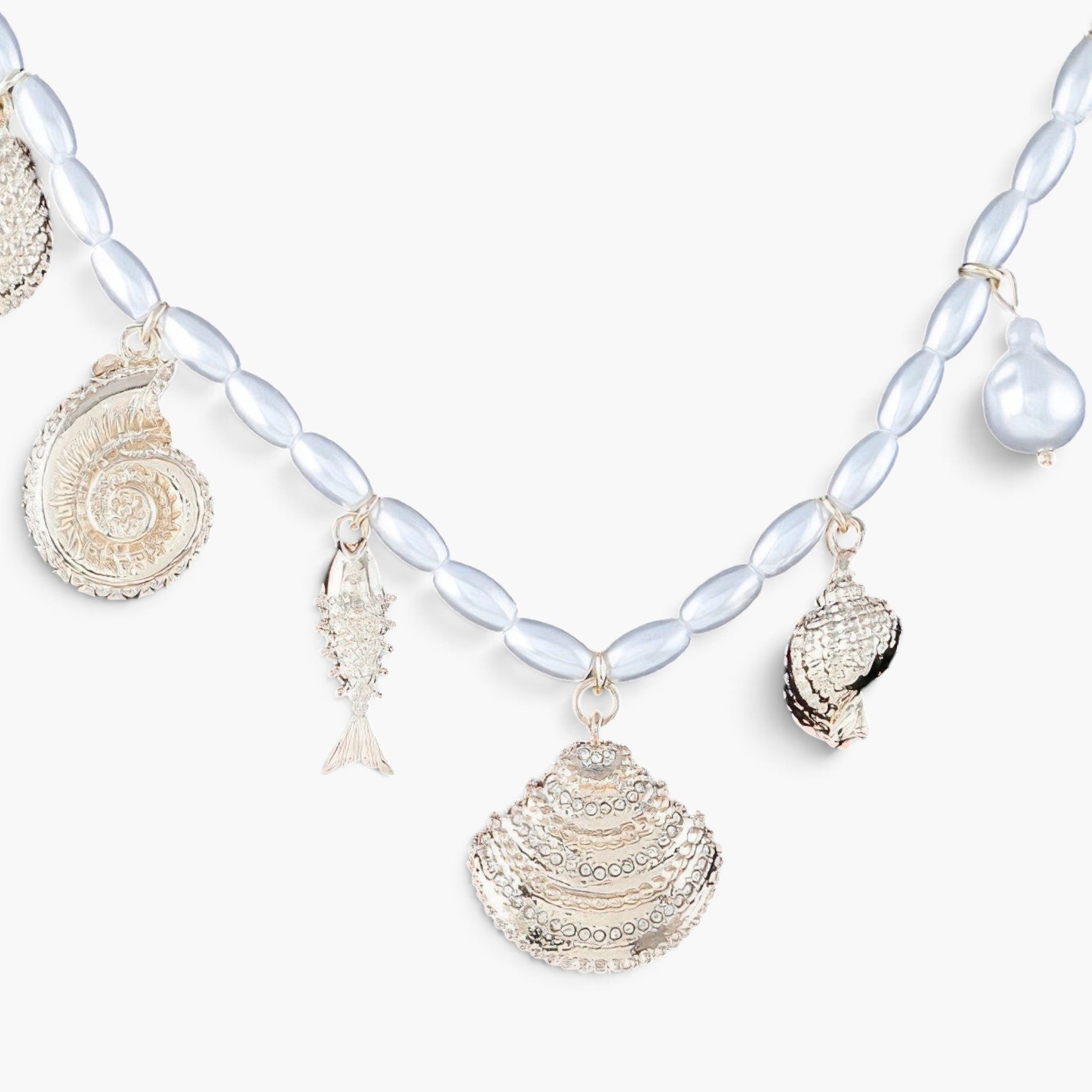 Beach Rose Co. Pearled Under the Sea charm necklace featuring gold-tone nautical charms and lustrous white pearls.