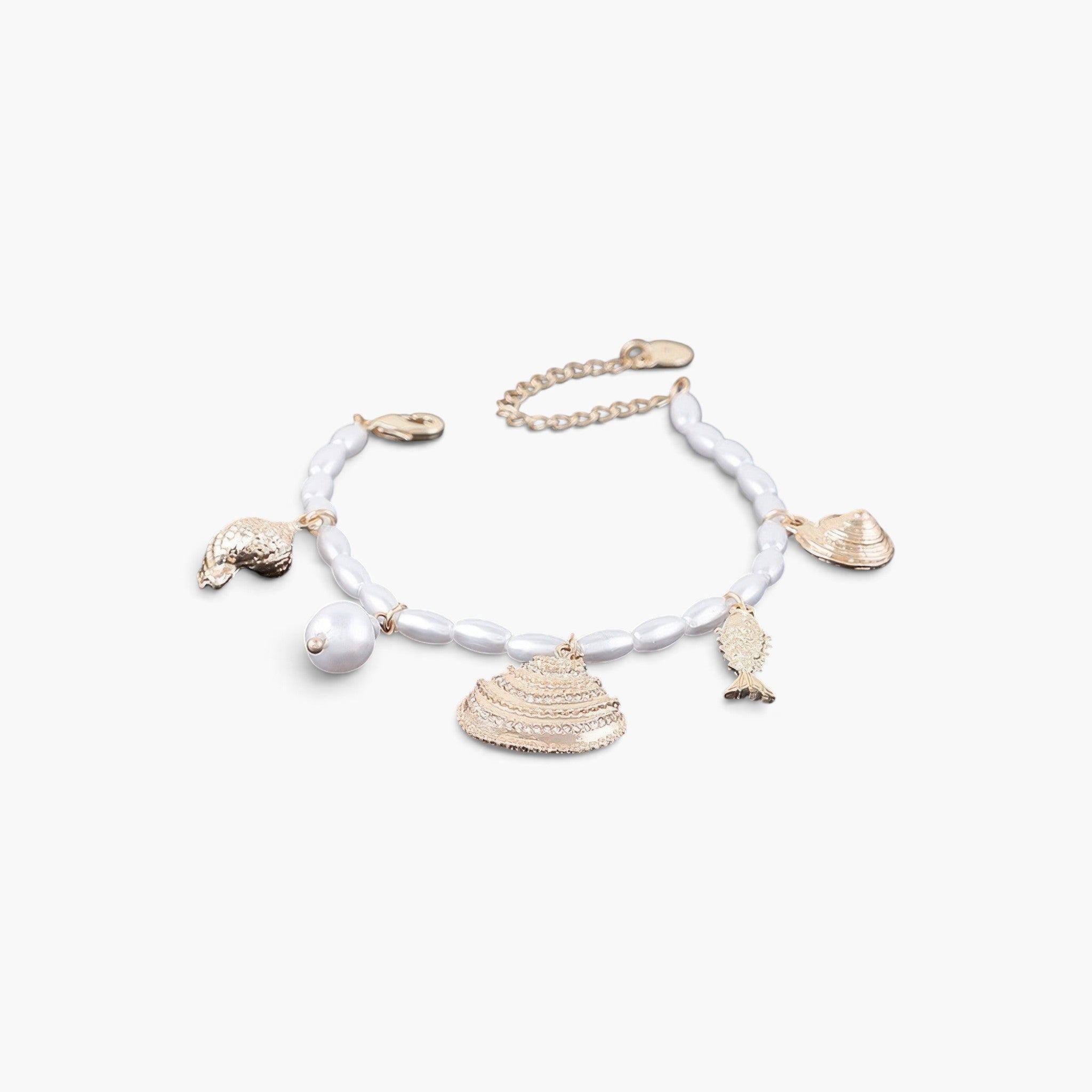 Beach Rose Co. Jeweled Under The Sea Bracelet featuring white pearls and gold-toned shell and fish charms