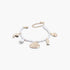 Beach Rose Co. Jeweled Under The Sea Bracelet featuring white pearls and gold-toned shell and fish charms